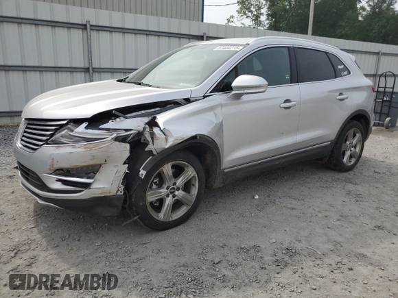 2017 Lincoln MKC Premiere with VIN 5LMCJ1C91HUL32617, listed as a Copart auction lot 57444215 with 106,285 mi miles and Salvage title. Bid and sale history available at DreamBid. Image 1.