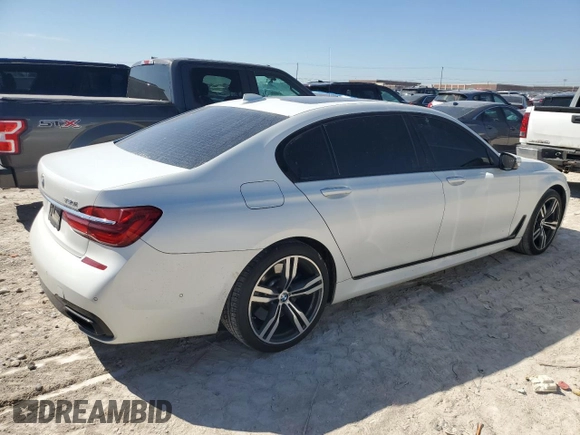 2019 BMW 7 Series 750i with VIN WBA7F0C5XKGM25348, listed as a Copart auction lot 46537485 with 54,365 mi miles and Salvage title. Bid and sale history available at DreamBid. Image 3.