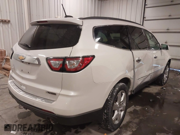 2017 Chevrolet Traverse Premier with VIN 1GNKVJKD9HJ340891, listed as a IAAI auction lot 41601595 with 96,647 mi miles and . Bid and sale history available at DreamBid. Image 4.