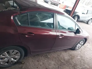 2012 Honda Civic LX z VIN 2HGFB2F50CH596442, wystawiony jako IAAI lot #42160402 z przebiegiem 130 152 mil mil oraz . Historia ofert i sprzedaży dostępna na DreamBid. Obrazek 13.