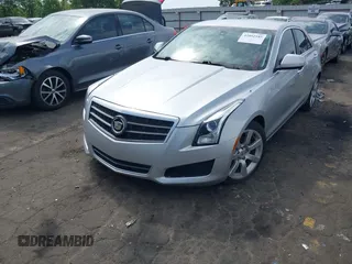 2014 Cadillac ATS Standard RWD with VIN 1G6AA5RA2E0103019, listed as a IAAI auction lot 42092185 with 114,373 mi miles and . Bid and sale history available at DreamBid. Image 2.
