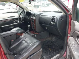 2006 GMC Envoy SLE z VIN 1GKDT13S262222939, wystawiony jako IAAI lot #42210957 z przebiegiem 238 217 mil mil oraz . Historia ofert i sprzedaży dostępna na DreamBid. Obrazek 5.
