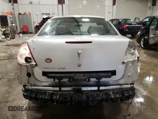 2009 Pontiac G6 1SA z VIN 1G2ZG57B294112235, wystawiony jako Copart lot #86734174 z przebiegiem 111 612 mil mil oraz Nie do naprawy. Historia ofert i sprzedaży dostępna na DreamBid. Obrazek 6.