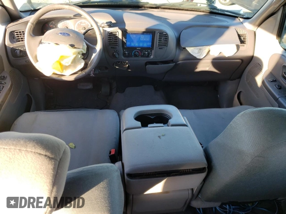 2003 Ford F-150 XLT with VIN 1FTRW08693KC51672, listed as a Copart auction lot 41368805 with 150,614 mi miles and Salvage Title. Bid and sale history available at carsss.com. Image 8.