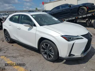 2022 Lexus UX 200 z VIN JTHP3JBH8N2055563, wystawiony jako IAAI lot #42462891 z przebiegiem 25 828 mil mil oraz . Historia ofert i sprzedaży dostępna na DreamBid. Obrazek 1.