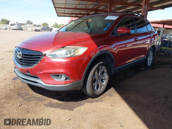 2014 Mazda CX-9 Touring with VIN JM3TB2CV5E0444144, listed as a IAAI auction lot 41892186 with 177,653 mi miles and . Bid and sale history available at DreamBid. Image 2.