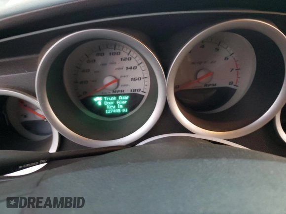 2006 Dodge Charger SRT-8 with VIN 2B3KA73W26H279925, listed as a Copart auction lot 78479574 with 127,443 mi miles and Salvage Title. Bid and sale history available at DreamBid. Image 9.