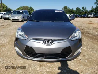 2016 Hyundai Veloster with VIN KMHTC6AD7GU248608, listed as a Copart auction lot 65809693 with 104,784 mi miles. Bid and sale history available at carsss.com. Image 5.
