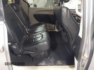 2017 Chrysler Pacifica Touring L with VIN 2C4RC1BG7HR831320, listed as a IAAI auction lot 41805697 with 137,743 mi miles and . Bid and sale history available at DreamBid. Image 8.