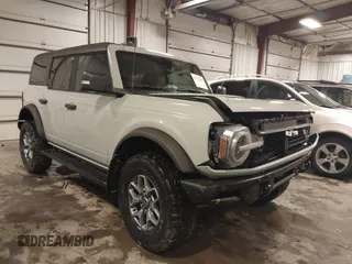 2021 Ford Bronco z VIN 1FMEE5DP0MLA64549, wystawiony jako IAAI lot #41719646 z przebiegiem 33 089 mil mil oraz . Historia ofert i sprzedaży dostępna na DreamBid. Obrazek 1.