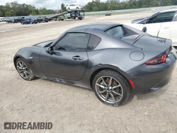 2023 Mazda MX-5 Miata Grand Touring with VIN JM1NDAM7XP0558827, listed as a Copart auction lot 79390864 with 14,901 mi miles and Salvage title. Bid and sale history available at DreamBid. Image 2.