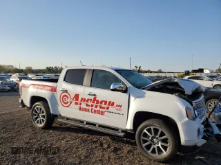 2022 GMC Canyon 4WD Denali with VIN 1GTG6EEN0N1315879, listed as a Copart auction lot 74703684 with 41,897 mi miles and Salvage Title. Bid and sale history available at carsss.com. Image 4.