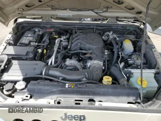 2018 Jeep Wrangler Unlimited Sport S with VIN 1C4BJWDG1JL899029, listed as a Copart auction lot 54361235 with 117,655 mi miles and Salvage Title. Bid and sale history available at DreamBid. Image 12.