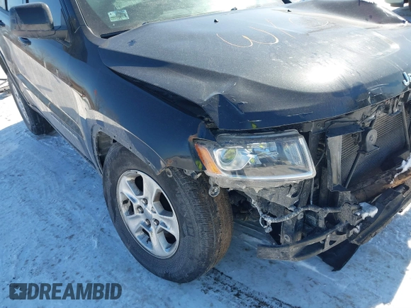 2016 Jeep Grand Cherokee Laredo z VIN 1C4RJFAG0GC425732, wystawiony jako IAAI lot #41641806 z przebiegiem 174 871 mil mil oraz . Historia ofert i sprzedaży dostępna na DreamBid. Obrazek 19.