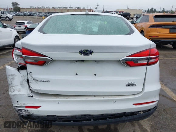 2020 Ford Fusion SE z VIN 3FA6P0LU2LR253612, wystawiony jako IAAI lot #41798850 z przebiegiem 58 219 mil mil oraz . Historia ofert i sprzedaży dostępna na DreamBid. Obrazek 16.