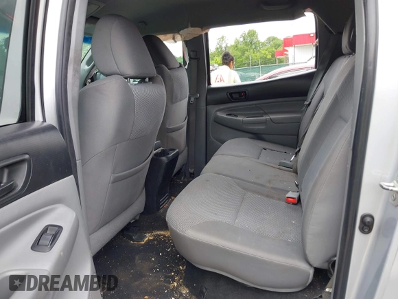 2013 Toyota Tacoma with VIN 3TMMU4FN1DM055477, listed as a IAAI auction lot 42306479 with 191,792 mi miles and . Bid and sale history available at DreamBid. Image 8.