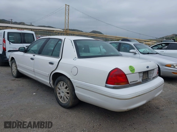 2003 Ford Crown Victoria LX z VIN 2FAFP74WX3X154904, wystawiony jako IAAI lot #42094274 z przebiegiem 123 579 mil mil oraz . Historia ofert i sprzedaży dostępna na DreamBid. Obrazek 3.