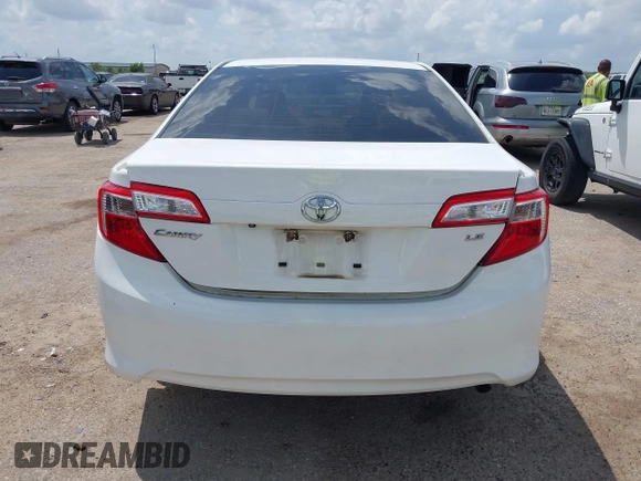 2014 Toyota Camry L with VIN 4T4BF1FK2ER375590, listed as a IAAI auction lot 42101553 with 126,849 mi miles and . Bid and sale history available at DreamBid. Image 16.