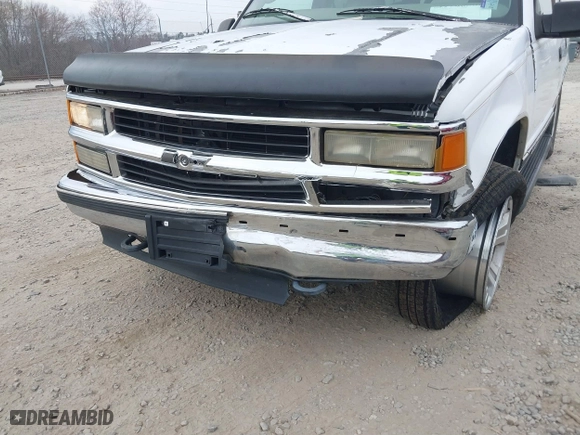 1997 Chevrolet Tahoe with VIN 1GNEK13R4VJ361515, listed as a IAAI auction lot 41768386 with 216,974 mi miles. Bid and sale history available at carsss.com. Image 6.