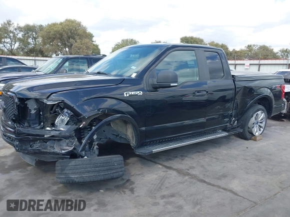 2018 Ford F-150 XL with VIN 1FTEX1CP8JKF28410, listed as a IAAI auction lot 40678411 with 64,138 mi miles and . Bid and sale history available at DreamBid. Image 6.