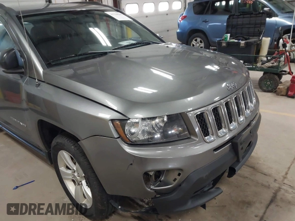 2014 Jeep Compass Sport with VIN 1C4NJDBB5ED567863, listed as a IAAI auction lot 41704644 with 163,405 mi miles. Bid and sale history available at carsss.com. Image 6.