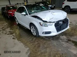 2017 Audi A3 Premium z VIN WAUAUGFFXH1056382, wystawiony jako Copart lot #56946195 z przebiegiem 162 612 mil mil oraz Szkoda całkowita • Salvage title. Historia ofert i sprzedaży dostępna na DreamBid. Obrazek 13.