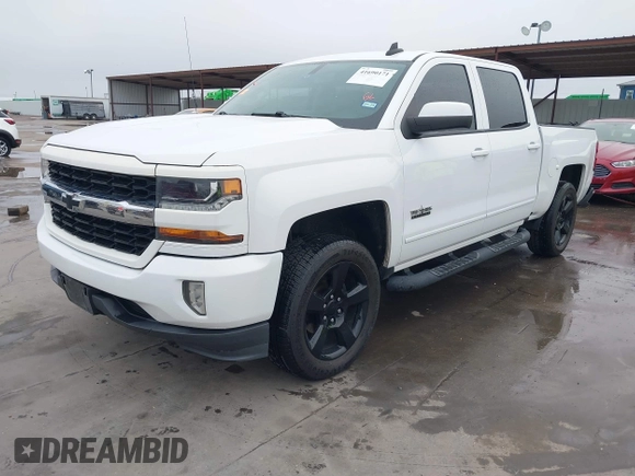 2017 Chevrolet Silverado 1500 LT with VIN 3GCPCRECXHG385460, listed as a IAAI auction lot 41690171 with 108,673 mi miles and . Bid and sale history available at DreamBid. Image 2.