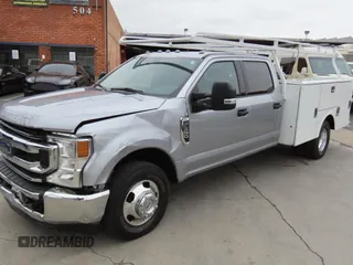 2022 Ford F-350 with VIN 1FD8W3GN5NEF58887, listed as a Copart auction lot 59009105 with 13,238 mi miles and Salvage title. Bid and sale history available at DreamBid. Image 2.