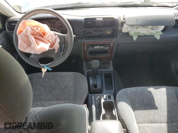 2002 Isuzu Rodeo S with VIN 4S2CK58W124322241, listed as a Copart auction lot 79009994 with 131,793 mi miles and Salvage Title. Bid and sale history available at DreamBid. Image 8.