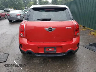 2014 MINI Countryman S with VIN WMWZC3C52EWP25379, listed as a Copart auction lot 61438355 with 76,943 mi miles and Salvage title. Bid and sale history available at DreamBid. Image 6.