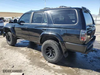 2000 Toyota 4Runner SR5 with VIN JT3HN86R6Y0273324, listed as a Copart auction lot 47113685 with 276,889 mi miles and Salvage Title. Bid and sale history available at carsss.com. Image 2.