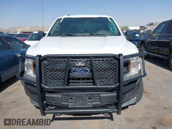 2018 Ford F-150 XL with VIN 1FTEW1E53JKE93841, listed as a IAAI auction lot 42256829 with 126,192 mi miles and . Bid and sale history available at DreamBid. Image 12.