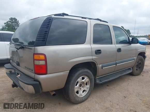 2003 Chevrolet Tahoe LS with VIN 1GNEC13V53R159937, listed as a IAAI auction lot 42138292 with 256,395 mi miles. Bid and sale history available at carsss.com. Image 4.