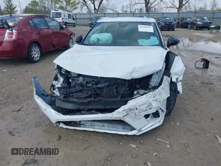 2023 Honda Civic Sport with VIN 19XFL2H80PE010813, listed as a IAAI auction lot 41999917 with 20,734 mi miles and . Bid and sale history available at DreamBid. Image 6.