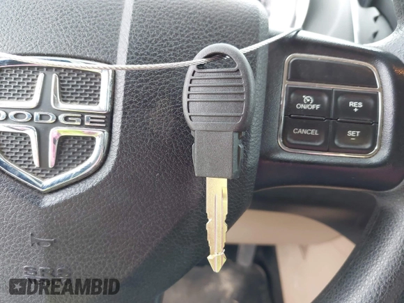 2015 Dodge Grand Caravan SXT with VIN 2C4RDGCG2FR548433, listed as a IAAI auction lot 42121256 with 161,459 mi miles and . Bid and sale history available at DreamBid. Image 11.