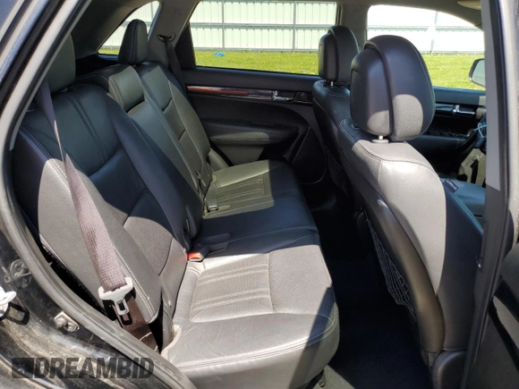2013 Kia Sorento SX z VIN 5XYKW4A29DG382771, wystawiony jako Copart lot #55823745 z przebiegiem 279 700 mil mil oraz Szkoda całkowita • Salvage title. Historia ofert i sprzedaży dostępna na DreamBid. Obrazek 11.