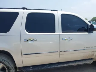 2011 Chevrolet Suburban LTZ with VIN 1GNSCKE06BR207874, listed as a IAAI auction lot 41903805 with 288,007 mi miles. Bid and sale history available at carsss.com. Image 13.