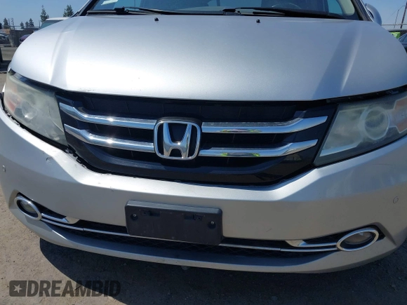 2014 Honda Odyssey Touring with VIN 5FNRL5H91EB068427, listed as a IAAI auction lot 42163315 with 184,134 mi miles and . Bid and sale history available at DreamBid. Image 21.
