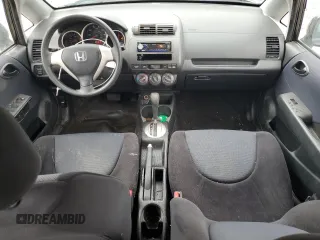 2008 Honda Fit with VIN JHMGD384X8S068090, listed as a Copart auction lot 61133985 with 177,729 mi miles and Clean title. Bid and sale history available at DreamBid. Image 8.