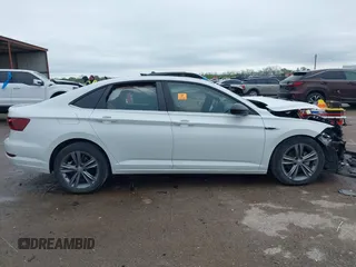 2021 Volkswagen Jetta S z VIN 3VWC57BUXMM017430, wystawiony jako IAAI lot #41947038 z przebiegiem 50 277 mil mil oraz . Historia ofert i sprzedaży dostępna na DreamBid. Obrazek 14.