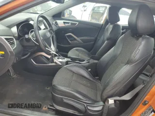 2013 Hyundai Veloster w/Black Int with VIN KMHTC6ADXDU121105, listed as a Copart auction lot 55171015 with 130,905 mi miles and Salvage title. Bid and sale history available at DreamBid. Image 7.