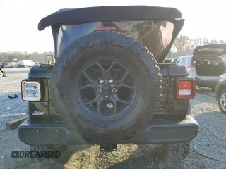 2024 Jeep Wrangler Sport S with VIN 1C4PJXDG1RW277777, listed as a Copart auction lot 49437045 with 10,405 mi miles and Salvage title. Bid and sale history available at DreamBid. Image 6.