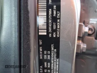 2018 Alfa Romeo Giulia Ti Sport z VIN ZARFAECN7J7576954, wystawiony jako Copart lot #57152095 z przebiegiem 80 235 mil mil oraz Szkoda całkowita • Salvage title. Historia ofert i sprzedaży dostępna na DreamBid. Obrazek 13.