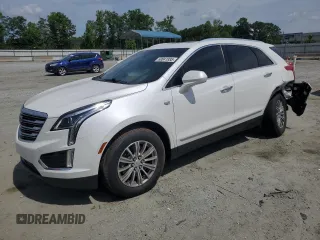 2019 Cadillac XT5 Luxury FWD with VIN 1GYKNCRS0KZ250069, listed as a Copart auction lot 60041885 with 56,809 mi miles and Salvage title. Bid and sale history available at DreamBid. Image 1.