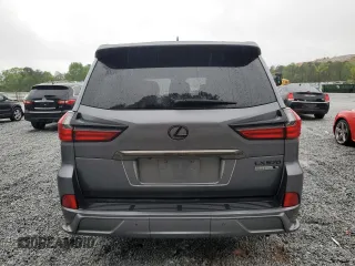2016 Lexus LX 570 with VIN JTJHY7AX0G4192598, listed as a Copart auction lot 51861185 with 118,710 mi miles and Salvage Title. Bid and sale history available at DreamBid. Image 6.