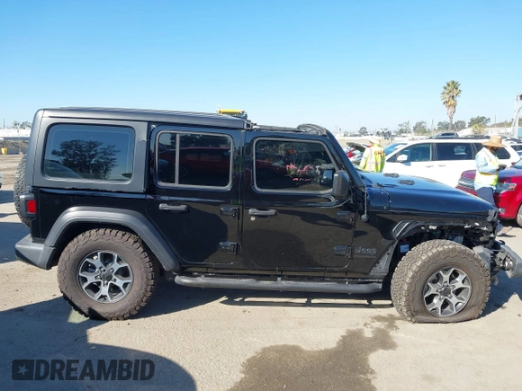 2023 Jeep Wrangler Willys with VIN 1C4HJXDN0PW597768, listed as a IAAI auction lot 41645815 with 23,717 mi miles and . Bid and sale history available at DreamBid. Image 14.
