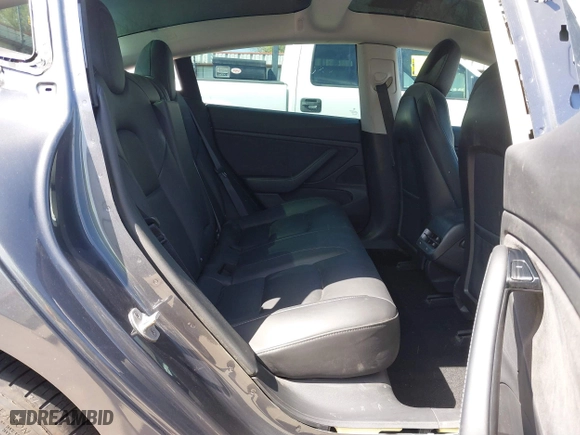 2018 Tesla Model 3 Long Range Battery with VIN 5YJ3E1EA4JF157782, listed as a IAAI auction lot 41774169 with 123,239 mi miles. Bid and sale history available at carsss.com. Image 8.