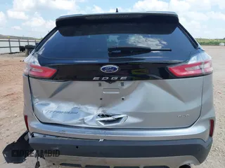 2022 Ford Edge Titanium with VIN 2FMPK4K99NBB06136, listed as a IAAI auction lot 42733977 with 57,794 mi miles and . Bid and sale history available at DreamBid. Image 16.
