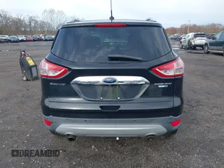 2014 Ford Escape Titanium with VIN 1FMCU9J98EUD73818, listed as a IAAI auction lot 42036442 with 129,794 mi miles. Bid and sale history available at carsss.com. Image 16.