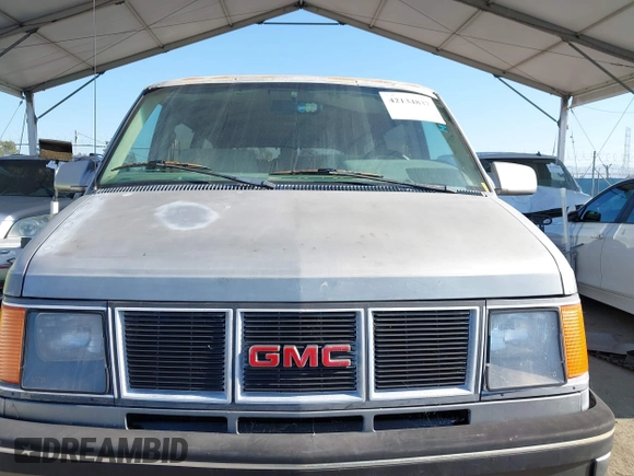 1991 GMC Safari z VIN 1GKDM19Z2MB530997, wystawiony jako IAAI lot #42134837 z przebiegiem 195 085 mil mil oraz . Historia ofert i sprzedaży dostępna na DreamBid. Obrazek 6.